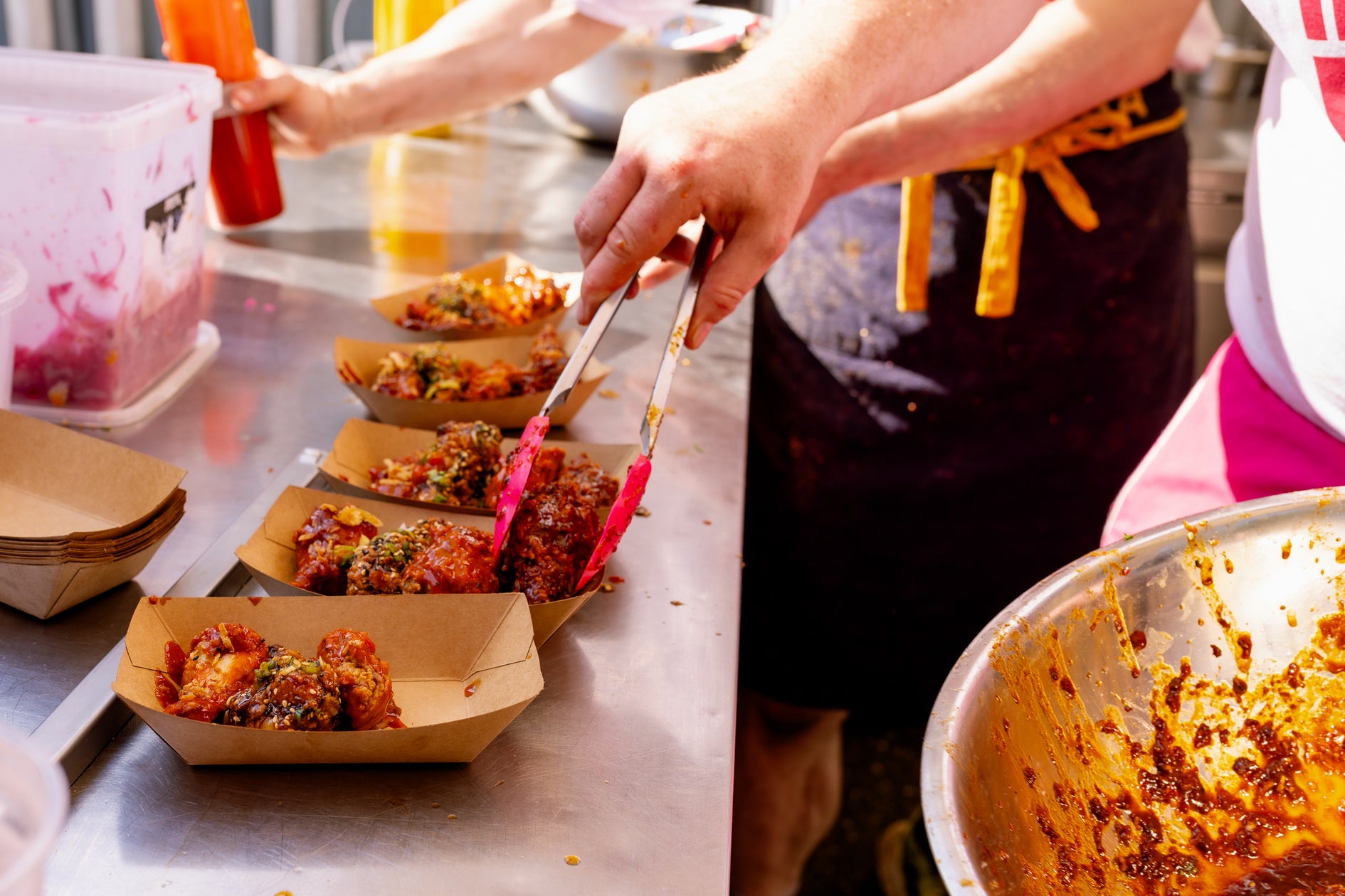 Chimac is serving their mouthwatering wings for wingjam visitors, WingJam London A Celebration of Chicken Wings and Friendship, WingJam London People Feasting on the Best Chicken Wings, WingJam London A Fun Day of Eating and Enjoyment, WingJam London Best Chicken Wing Festival in Town, WingJam London Friends Sharing Delicious Chicken Wings