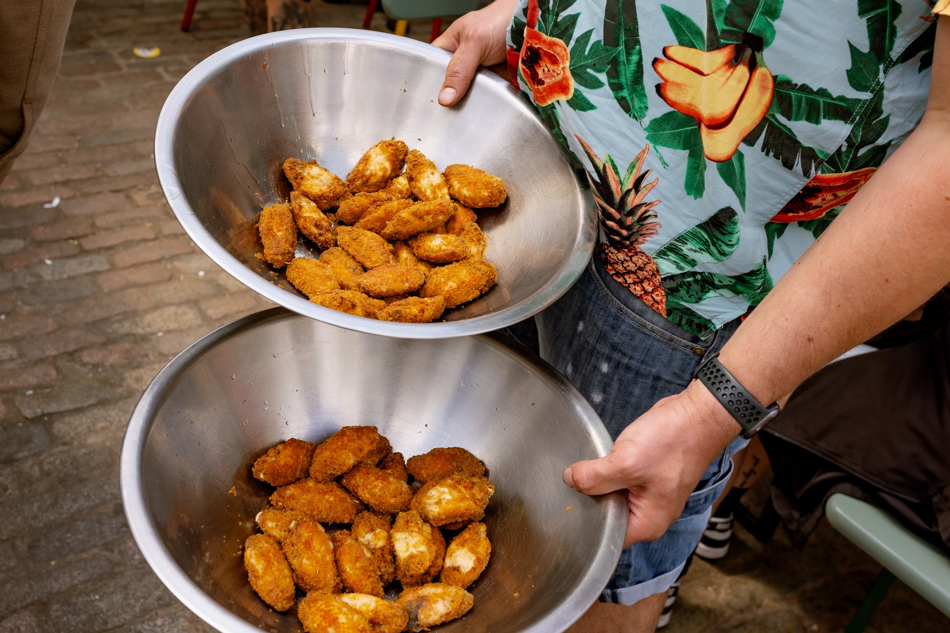 a bunch of plain chicken wings at wingjam London's best chicken wing festival, WingJam London A Gathering of Friends for Great Food, WingJam London Where Friends Feast on the Best Wings, WingJam London A Festival for Foodies and Friends, WingJam London Best Place to Enjoy Chicken Wings and Fun, WingJam London Friends Savoring the Festival’s Best Wings