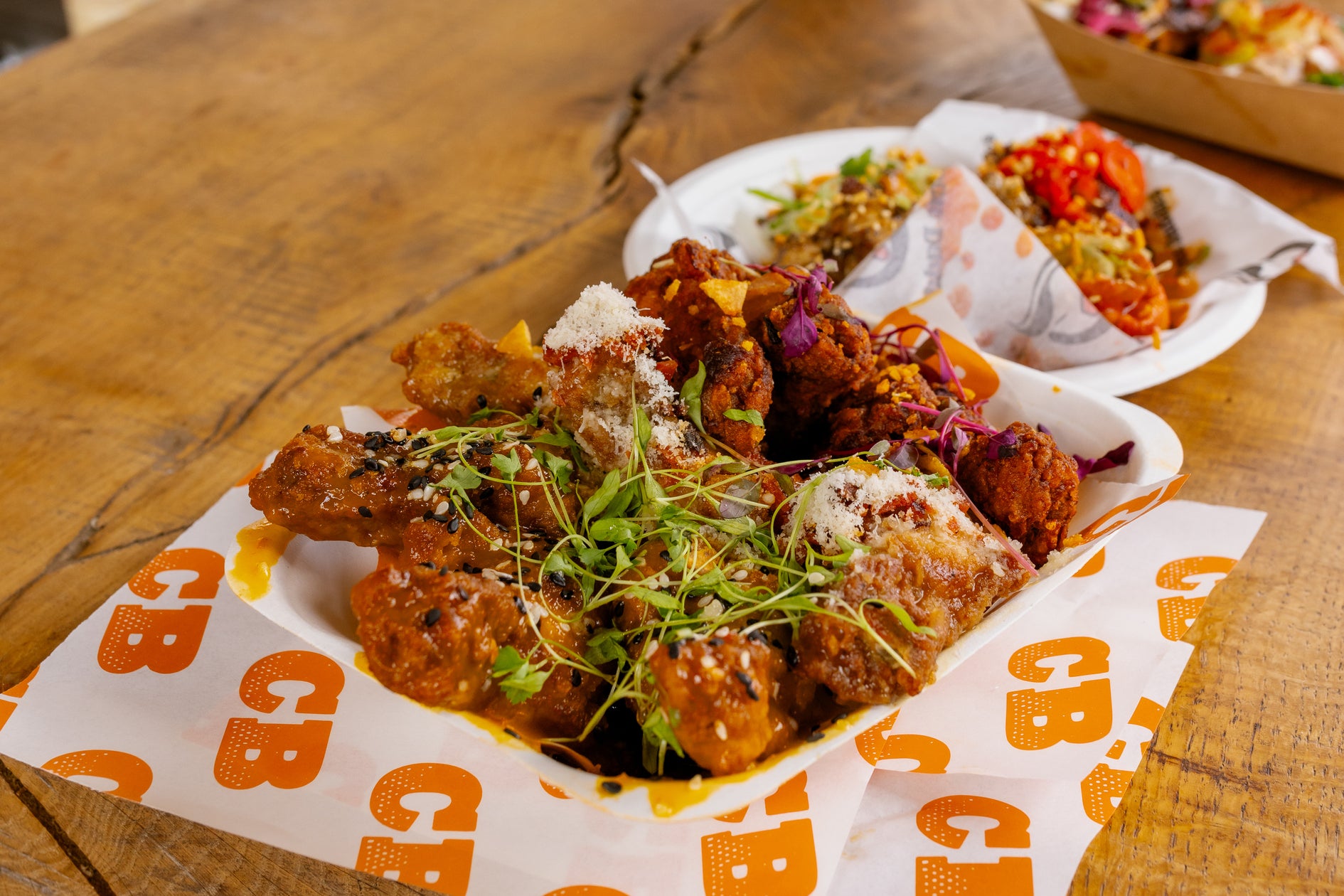 great wings from chicken bandits at wingjam best chicken wing event, WingJam London A Fun Event for Wing Lovers, WingJam London The Best Place to Feast on Chicken Wings, WingJam London A Festival Filled with Delicious Wings, WingJam London People Enjoying Every Flavorful Bite, WingJam London Where Friends Enjoy the Best Wings Together