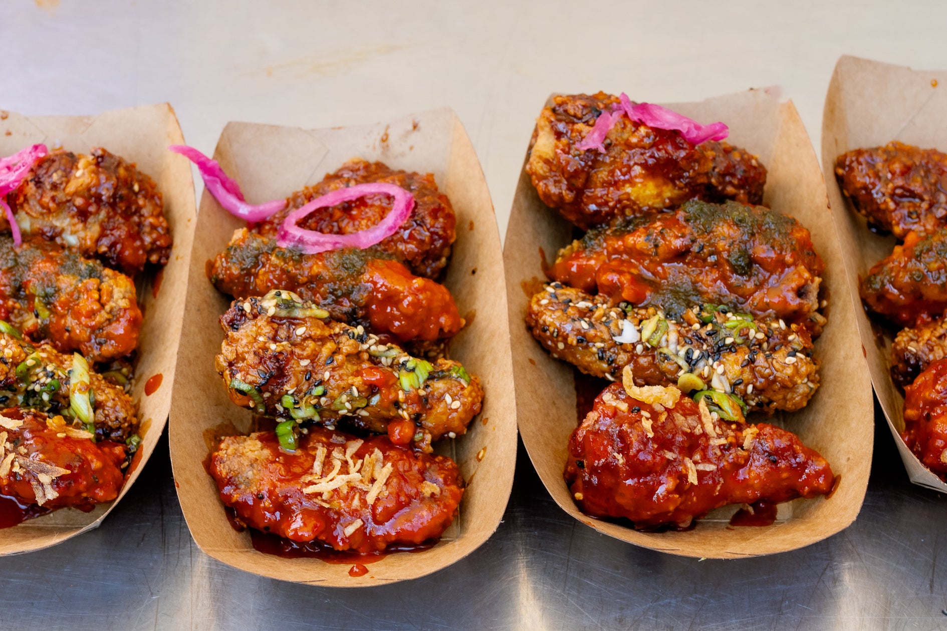 unbelievably tasty wings from Irish legends Chimac at wingjam, WingJam London A Tasty Experience for All, WingJam London Where Food Lovers Enjoy Great Wings, WingJam London A Festival for Friends Who Love Food, WingJam London The Ultimate Chicken Wing Experience with Friends, WingJam London People Gathering for the Best Wings, WingJam London A Fun Food Event for Friends and Family, WingJam London People Loving Every Bite of Chicken Wings