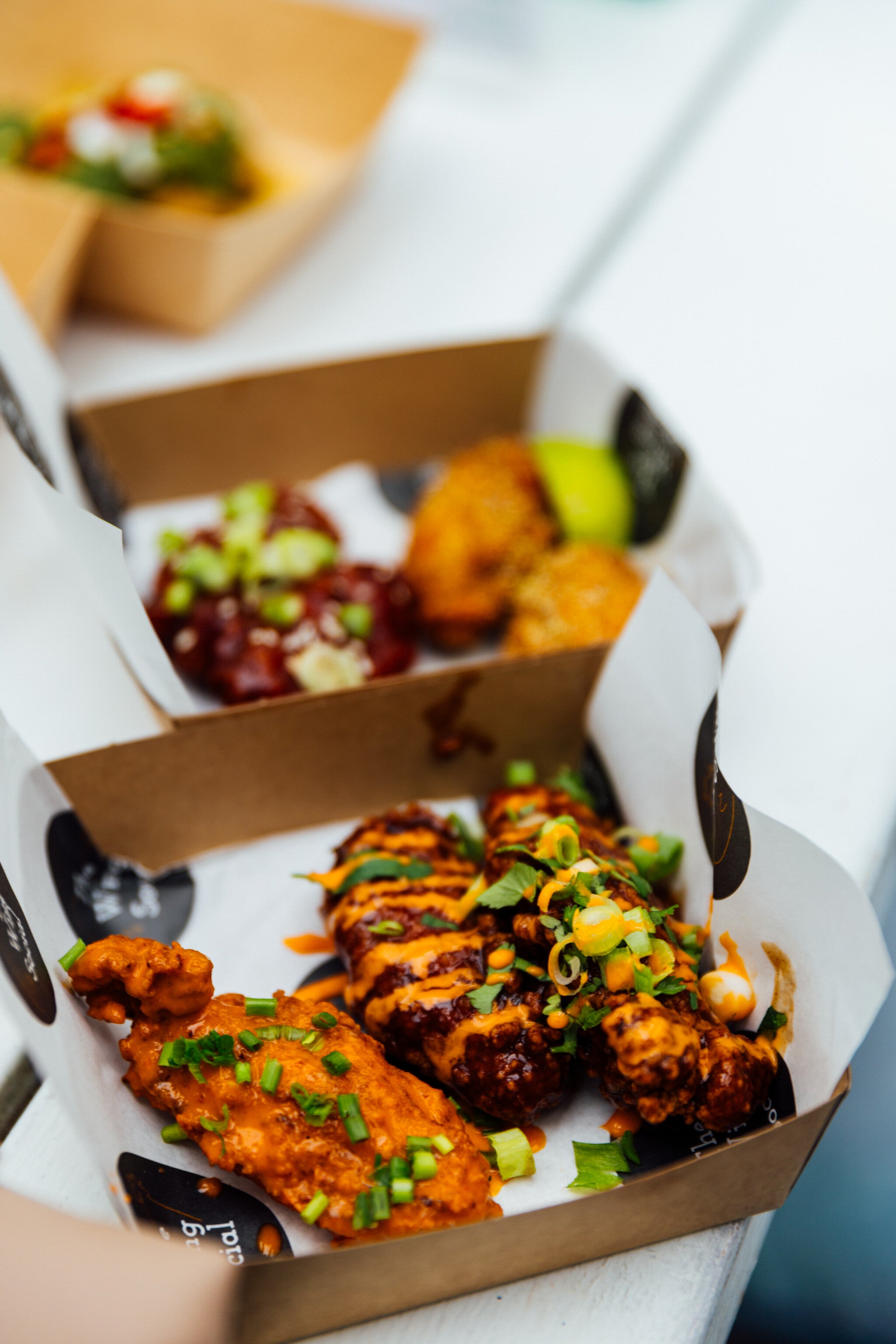 variety of wings from wing social at wingjam , WingJam London A Festival for Friends and Foodies, WingJam London The Best Chicken Wing Experience in Town, WingJam London Where the Best Wings and Best Friends Meet, WingJam London A Flavor-Packed Festival for Food Lovers, WingJam London Friends Enjoying Every Delicious Wing