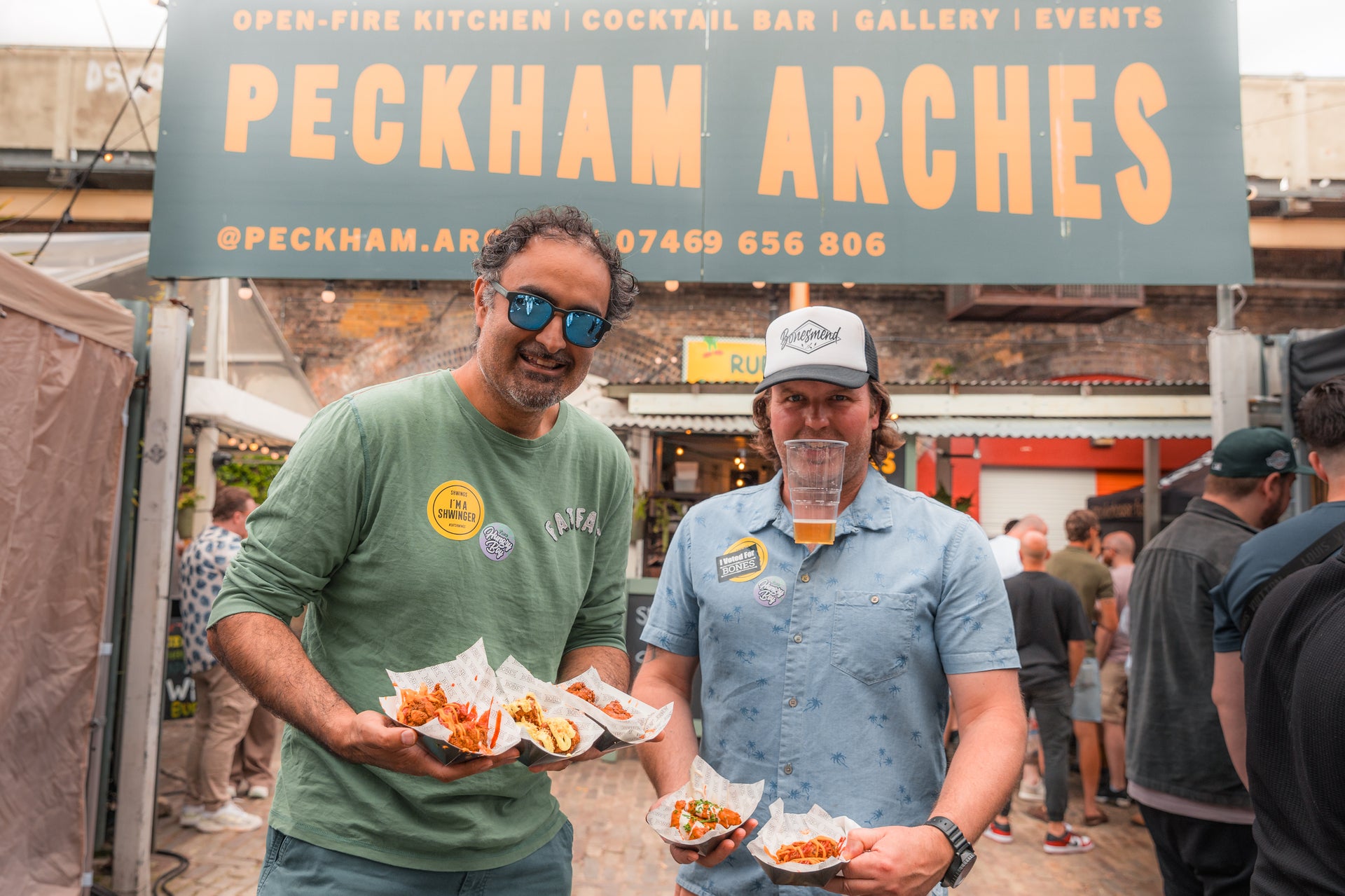 visitors love their timing at wingjam , WingJam London A Festival of Great Food and Great Company, WingJam London People Enjoying Every Bite Together, WingJam London A Flavor-Packed Gathering for Wing Lovers, WingJam London Friends Loving the Delicious Chicken Wings, WingJam London Where Friends Come Together for Food and Fun